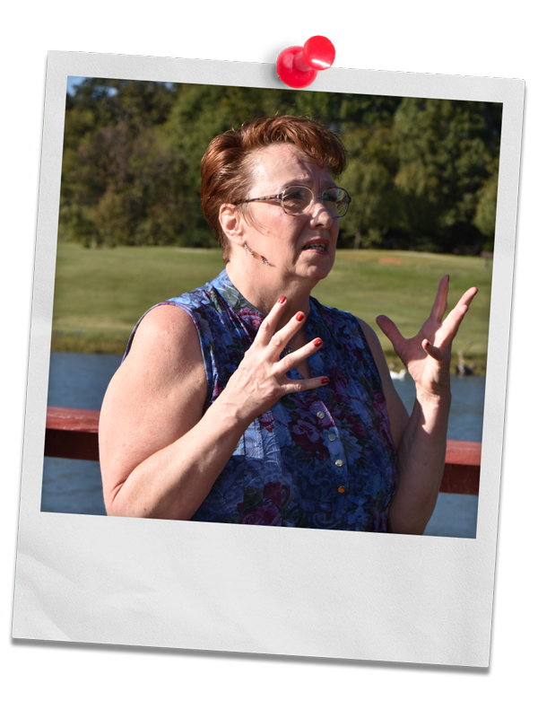 Photo of Coach Delisa on the dock at a lake